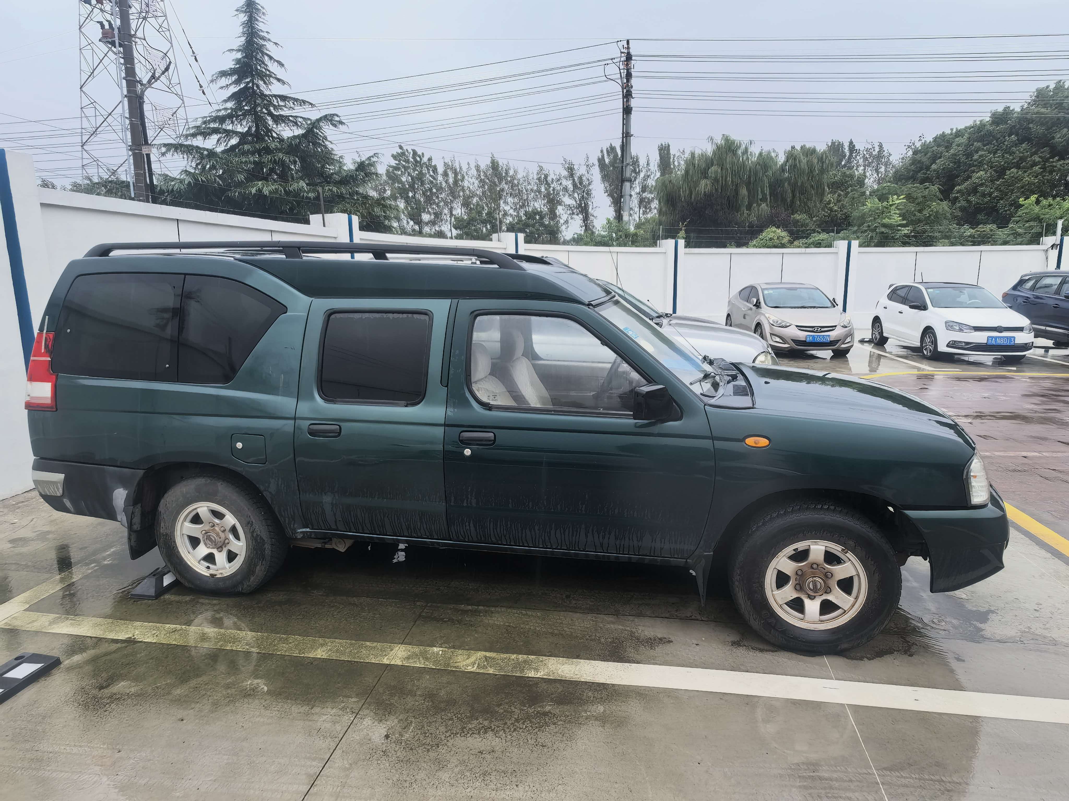 [扬州市]扬州市仪征市一辆尼桑ZN6492H2G小型客车处置项目